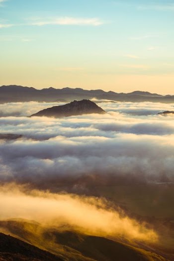 photo of clouds and mountains