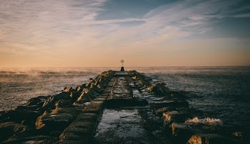 Photo of Concrete Pathway During Dawn 