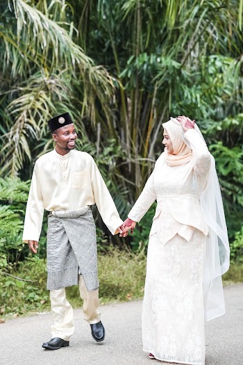 Photo Of Couple Holding Each Other
