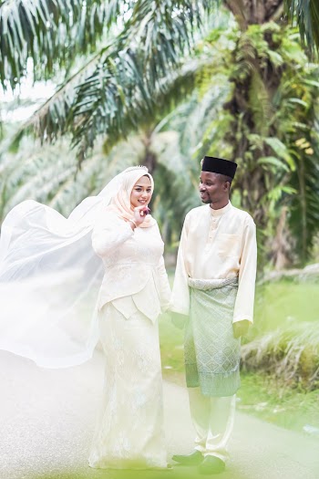 Photo Of Couple Holding Each Other