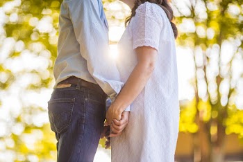 Photo Of Couple Holding Hands 