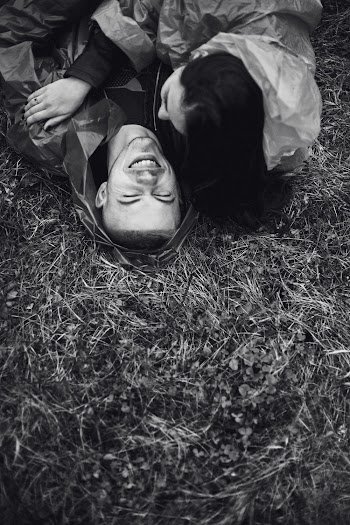 Photo Of Couple Laying On Grass
