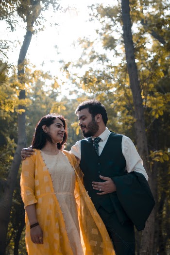 Photo of Couple Looking at Each Other