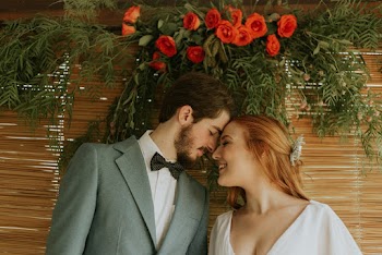 Photo of Couple Standing Close To Each Other