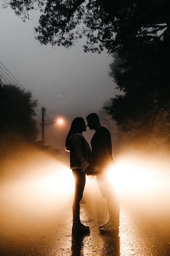Photo Of Couple Standing On Road