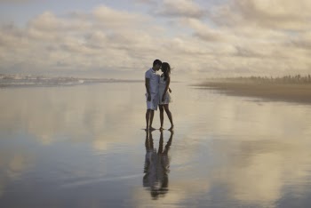 Photo Of Couple Standing On Water