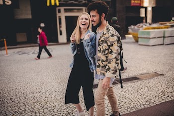 Photo of Couple Walking Together
