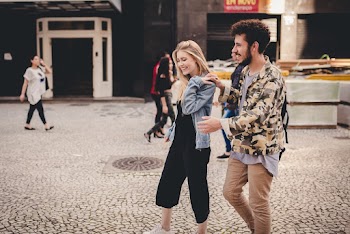 Photo of Couple Walking Together