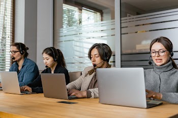 Photo of Coworkers Working on Their Laptops · Free Stock Photo