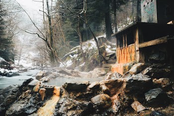 Photo of Creek with Rocks on a Cold Winter Day