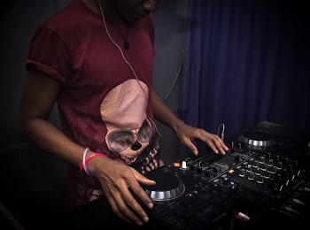 Photo of Disc Jockey on Turntables