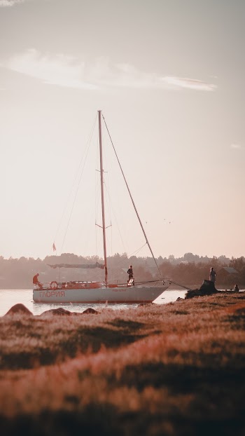 Photo Of Docked Boat During Dawn