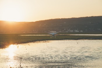 Photo of Drone Flying above the Lake