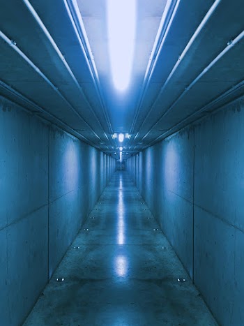 Photo of Empty Well Lit Hallway