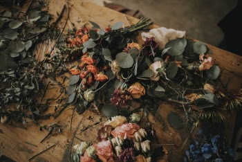 Photo of Flowers on Wooden Table