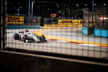 photo of formula one on track