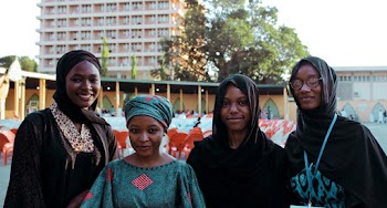 Photo of Four Women Wearing Turban