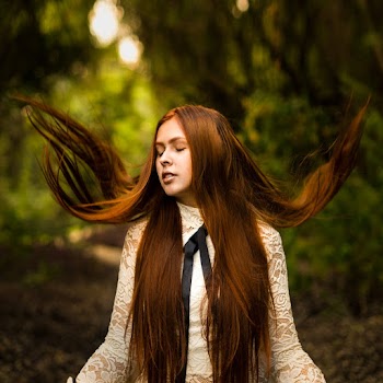 Photo Of Girl Closing Her Eyes