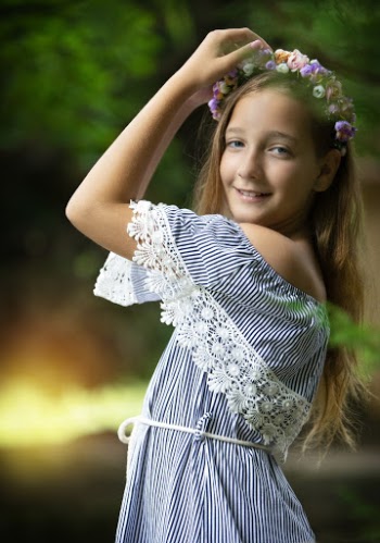 Photo Of Girl Holding Her Flower Crown