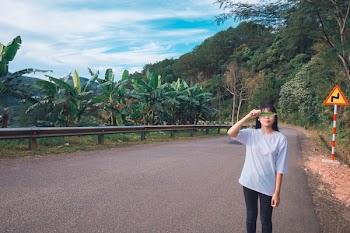 Photo of Girl Holding Leaf