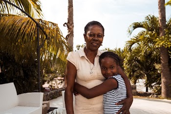 Photo of Girl Hugging Her Mother