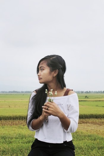 Photo of Girl in White Off-shoulder Top 