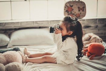 Photo of Girl Taking Photo