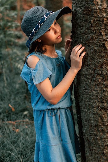 Photo of Girl Wearing Blue Dress