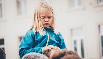 Photo of Girl Wearing Blue Jacket