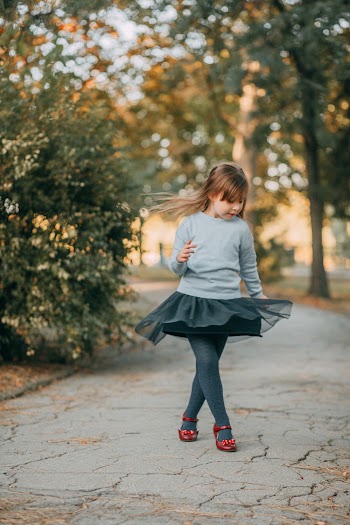 Photo Of Girl Wearing Gray Skirt