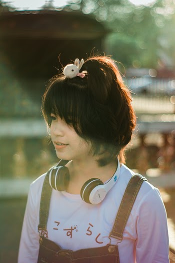Photo of Girl Wearing Headset