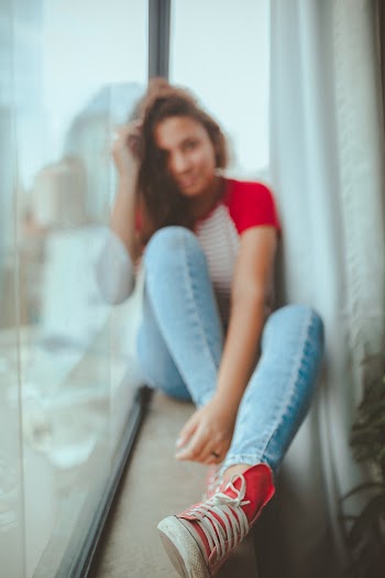 Photo of Girl Wearing Red Shoes