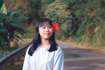 Photo of Girl With Flower in Her Hair