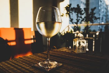 Photo of Glass of Wine on the Table