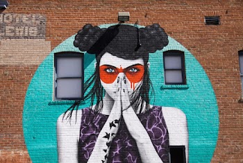 Photo of Graffiti on Brick Wall