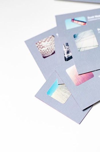 Photo of Gray Cards on White Surfafce