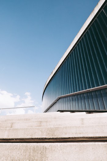 Photo of Gray Concrete Stairway Beside Building