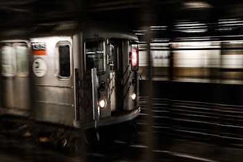 photo of gray moving train