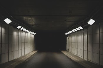photo of gray tunnel