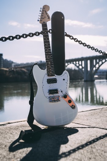 Photo Of Guitar Near River