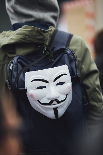Photo of Guy Fawkes Mask On Backpack
