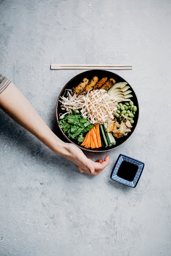Photo Of Hand Near Bowl