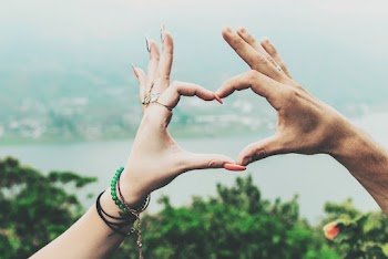 Photo of Hands in the Shape of Heart