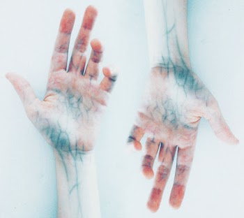 Photo of Hands with blue veins  