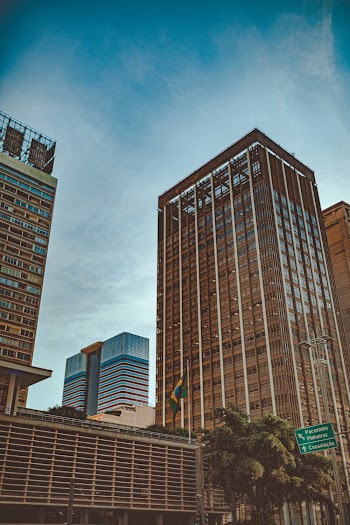 Photo of High-rise Buildings Under Clear Sky