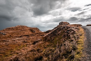 Photo of Hill Under Cloudy Sky