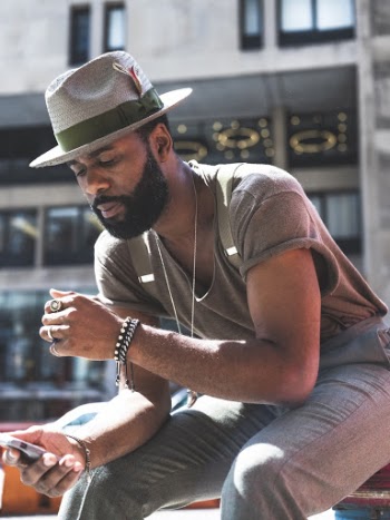 Photo Of Holding His Smartphone