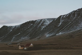 Photo of House near Mountain Scenery