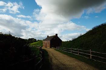 Photo of House Under Cloudy Sky