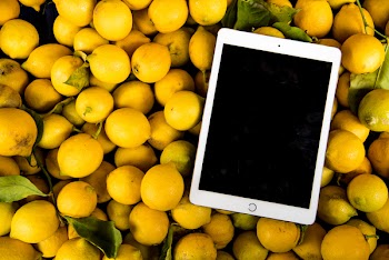 Photo of Ipad on Pile of Lemons